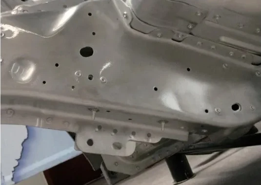 Figure 14 shows the application of aluminum stud welding on the Jaguar XE